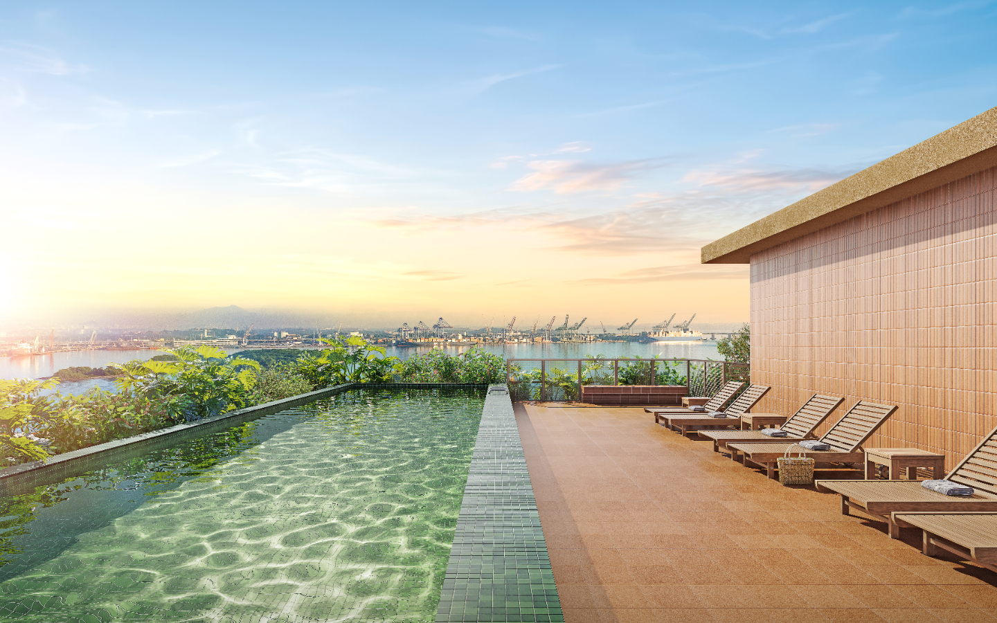 Piscina do rooftop com espreguiçadeiras e vista para a Baía de Guanabara